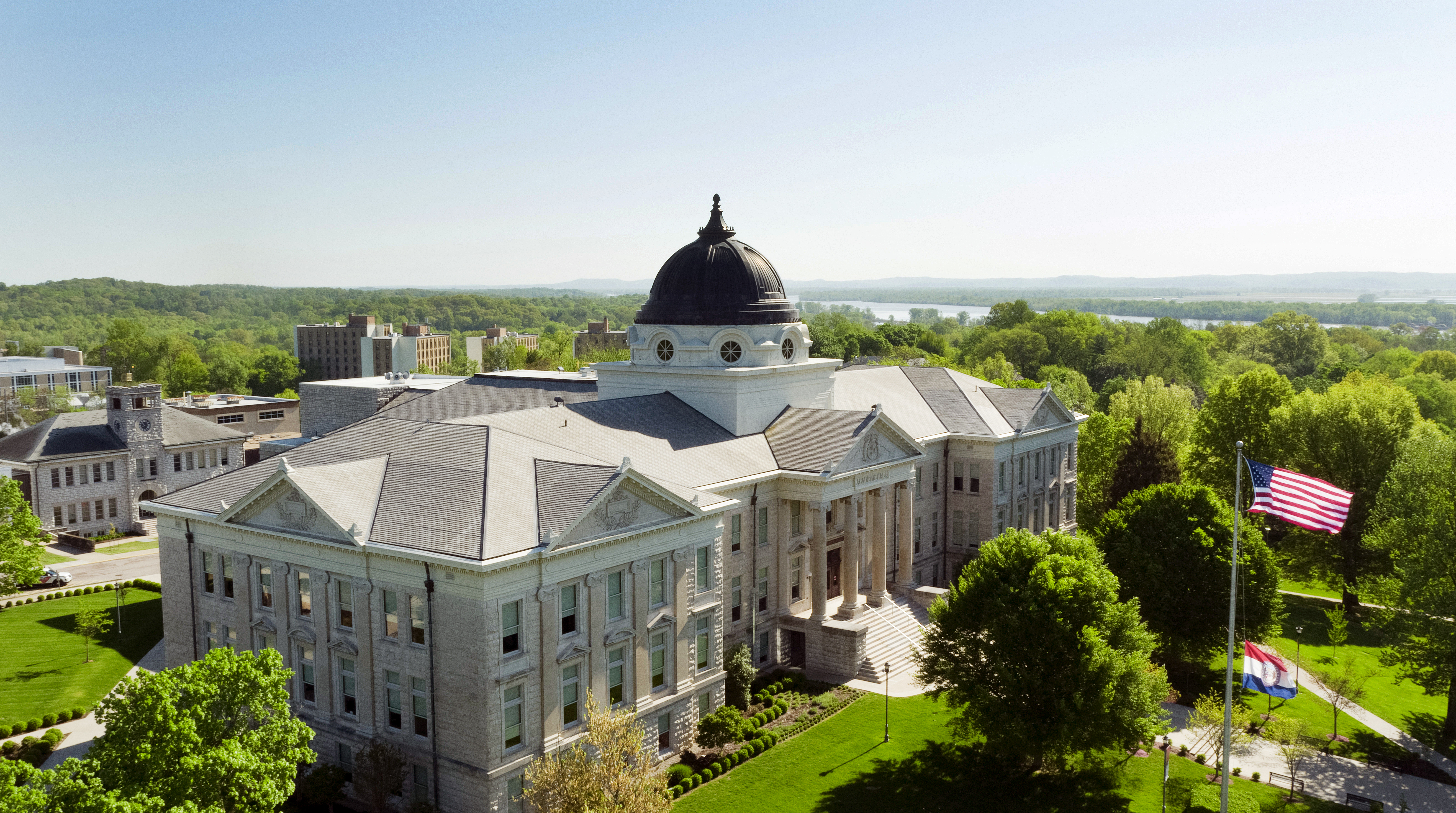 aerial view of academic hall on a bright sunny day